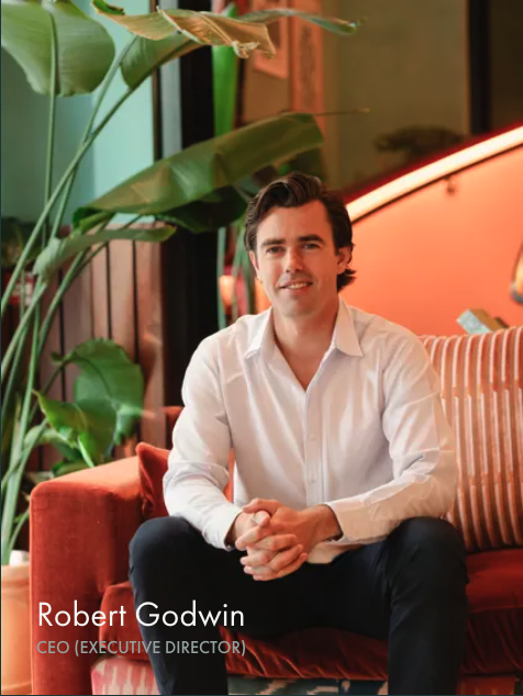 Robert Godwin, CEO of the Lamington Group, seated in an armchair